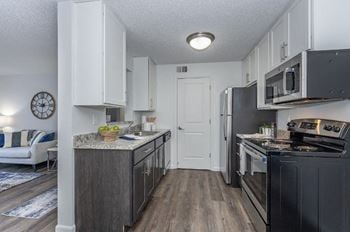 Kitchen with appliances and cabinets